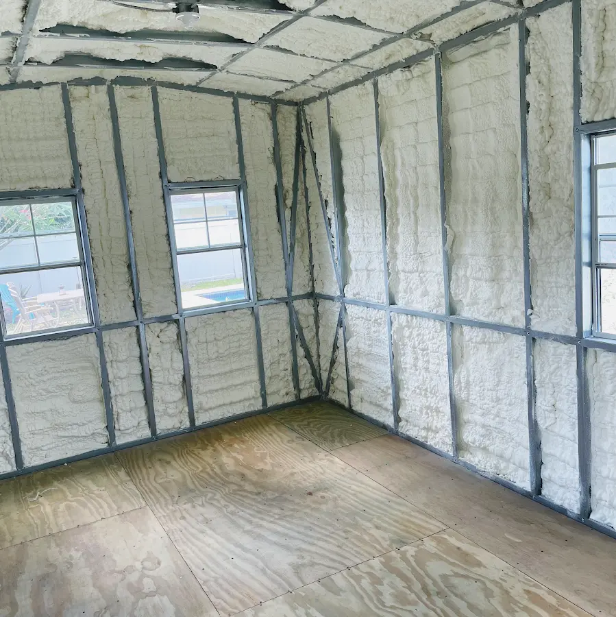 Closed-cell spray foam insulation applied to wall cavities in a residential project in Lake Holiday