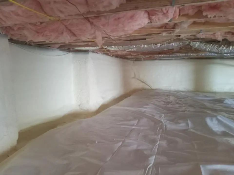 Crawl space encapsulation with closed-cell spray foam for Commercial Roof Restoration in Lake Holiday